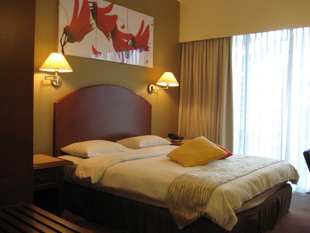Casuarina Hotel Kota Kinabalu Szoba fotó