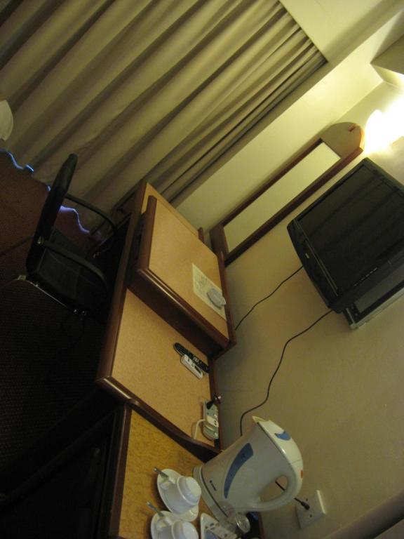 Casuarina Hotel Kota Kinabalu Szoba fotó